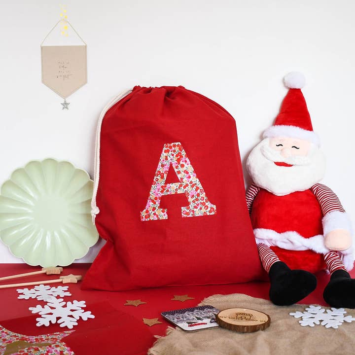 Liberty of London Christmas personalised gift sack in red for wholesale by My Little Shop UK