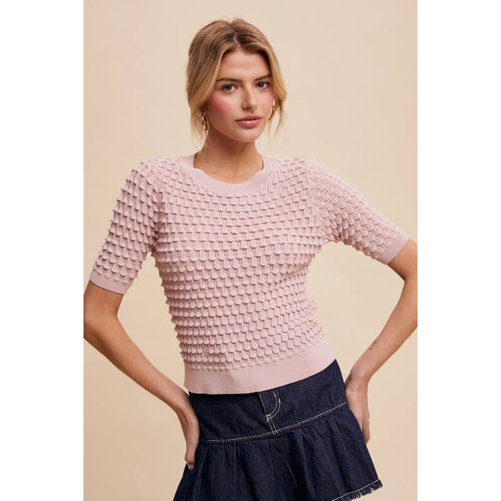 Haut en maille à bulles
Texture chic rencontre style intemporel pour la vente par Apolline