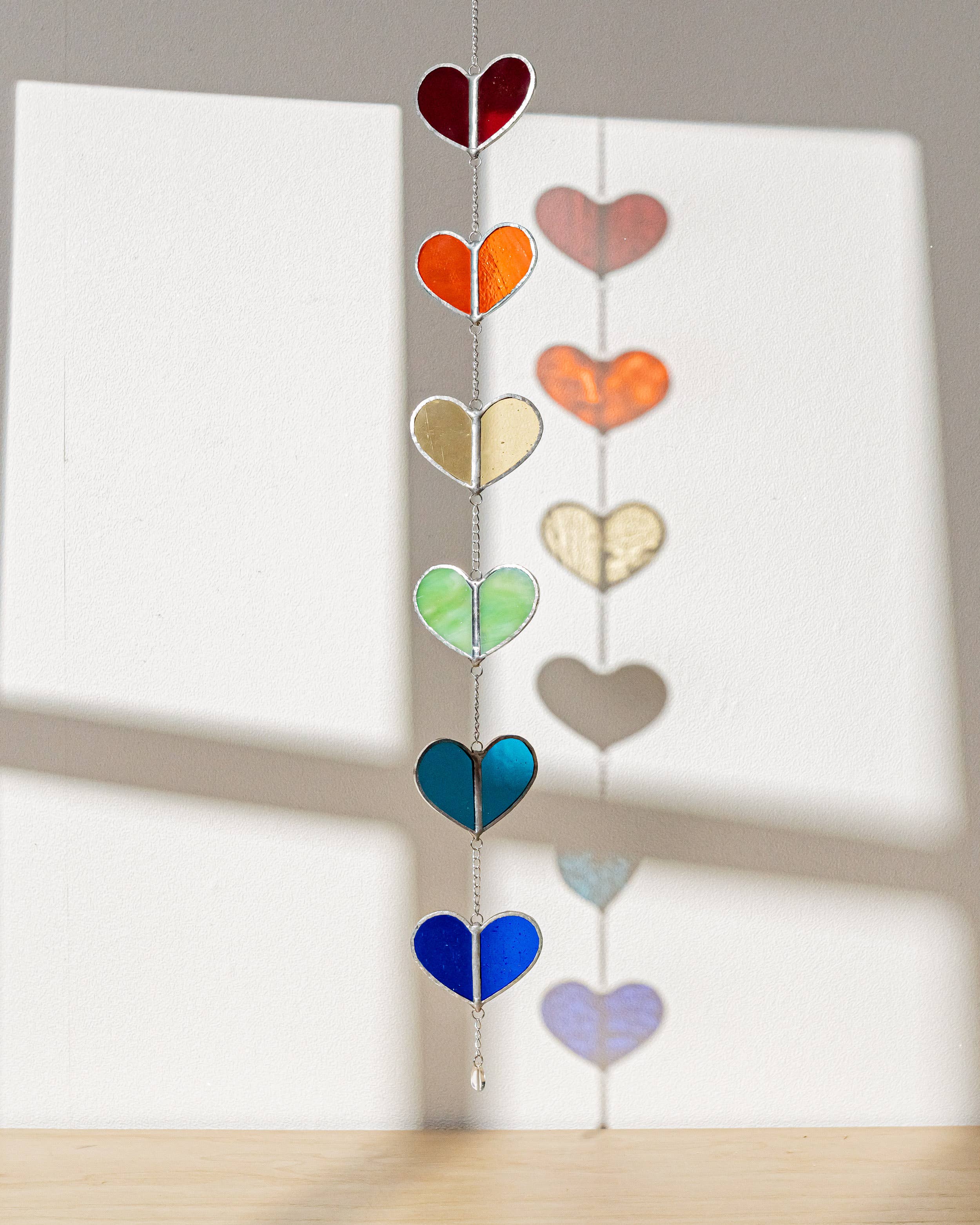 MondoBellissimo - Vendita all'ingrosso Bandierine/Ghirlande - Ghirlanda a cuore in vetro colorato F2210