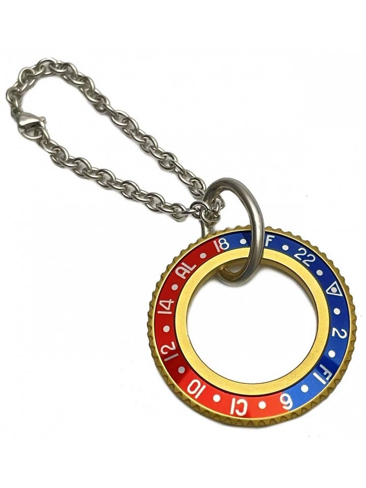 LLAVERO VELOCÍMETRO OFICIAL PVD ORO COLOR AZUL/ROJO para venta al por mayor de Speedometer Official