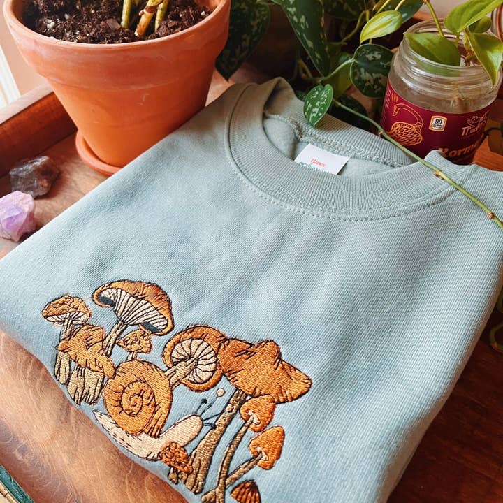 Sage Snail Shrooms Embroidered Crewneck for wholesale by LeBeau Denim Co.