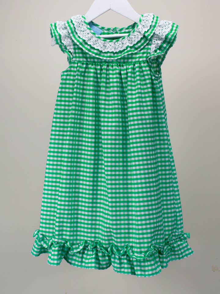 Robe Laura verte et blanche pour la vente par Charming Little Ones