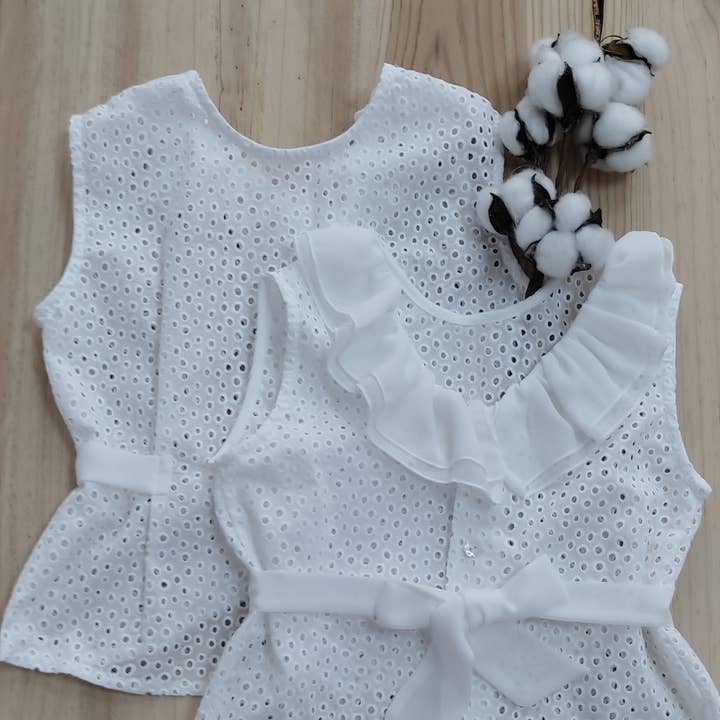 Desireé baby bluse uden lange ærmer for engroshandel hos La Boutique de Kannela