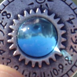 Ragalaxys - Venta al por mayor Collares con colgantes/abalorios - Collar con Reloj de Sol Saturno Serie Fashion3