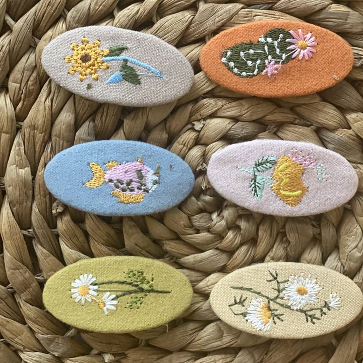 Set di fermagli ricamati per la vendita all'ingrosso da parte di nora norita nora