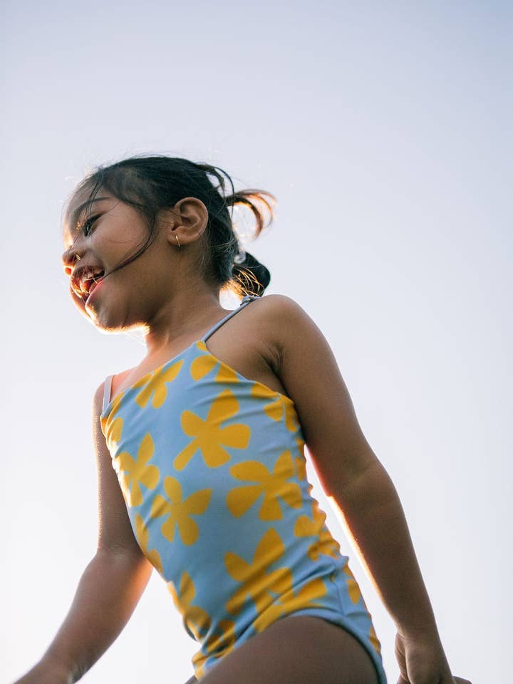 Girl's Strappy One Piece in Light Blue Plumeria for wholesale by Of One Sea
