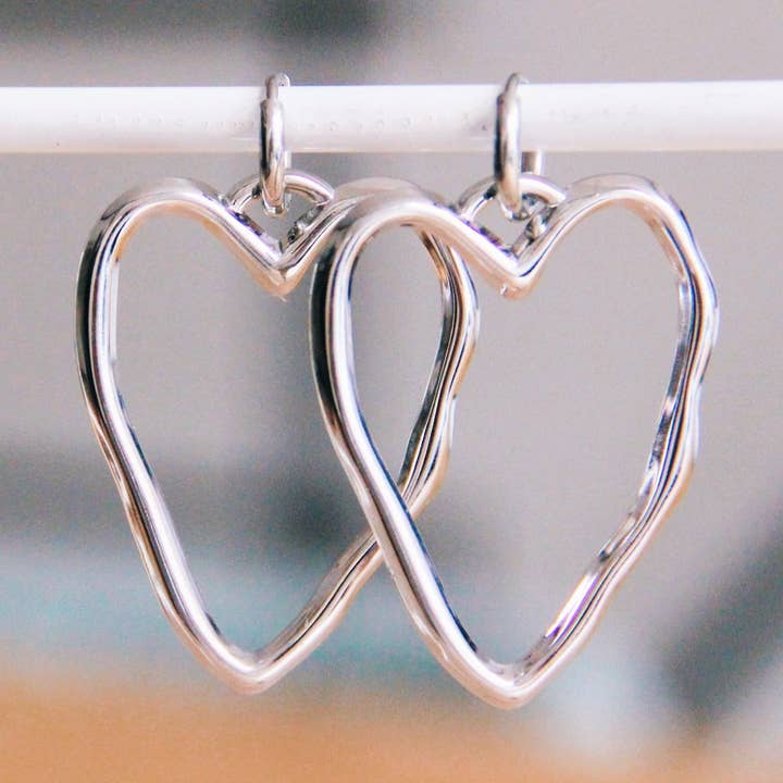 Stainless steel earring with XL open heart - silver for wholesale by Bazou