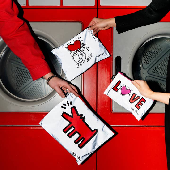 KEITH HARING Hund, Herz, Liebe Reflektierende Reißverschlusstaschen für den Großhandel von LOQI