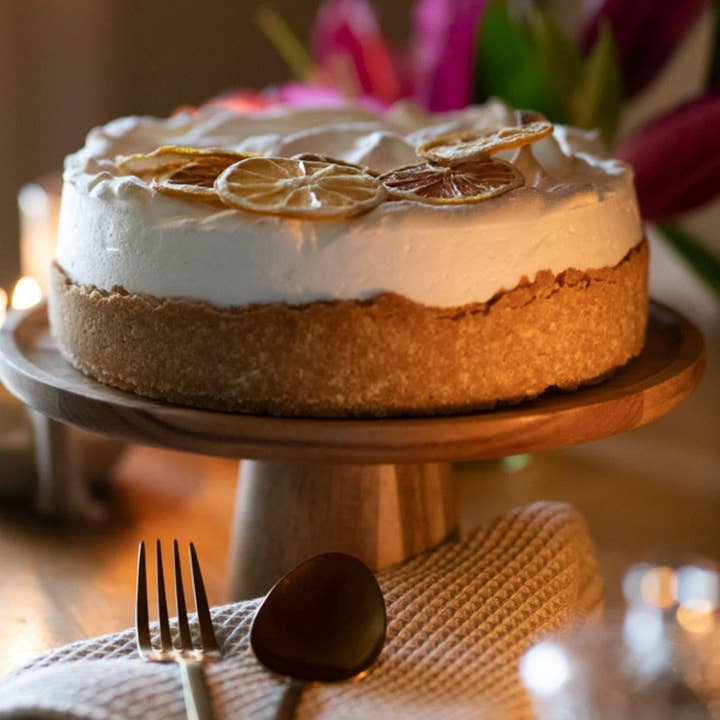 Brown wooden cake tray for wholesale by Andrea House