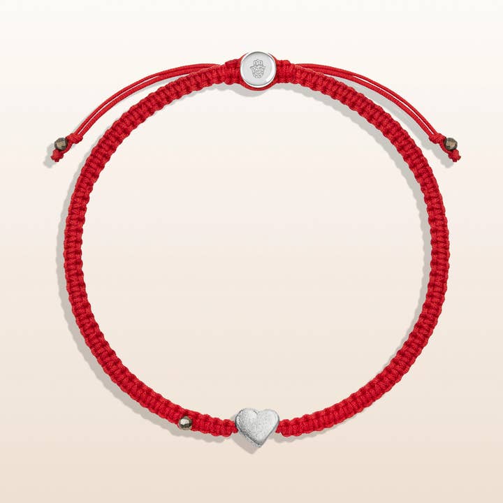 PROTECTED BY LOVE - RED STRING HEART CHARM BRACELET for wholesale by Karma And Luck