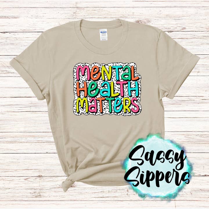 Mental Health Matters Sand T-shirt per la vendita all'ingrosso da parte di K. I. Designs