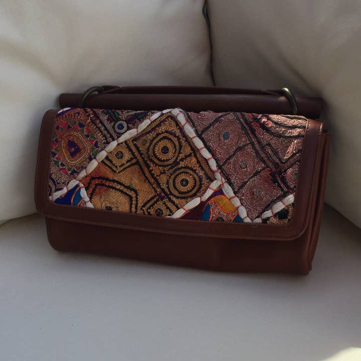 Läder Kopplingsväska med rem för wholesale av Tivello