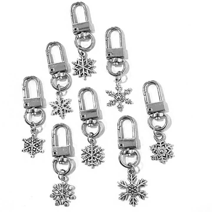 Portachiavi natalizi con cerniera a forma di fiocco di neve argentato per la vendita all'ingrosso da parte di Broken Record Boutique