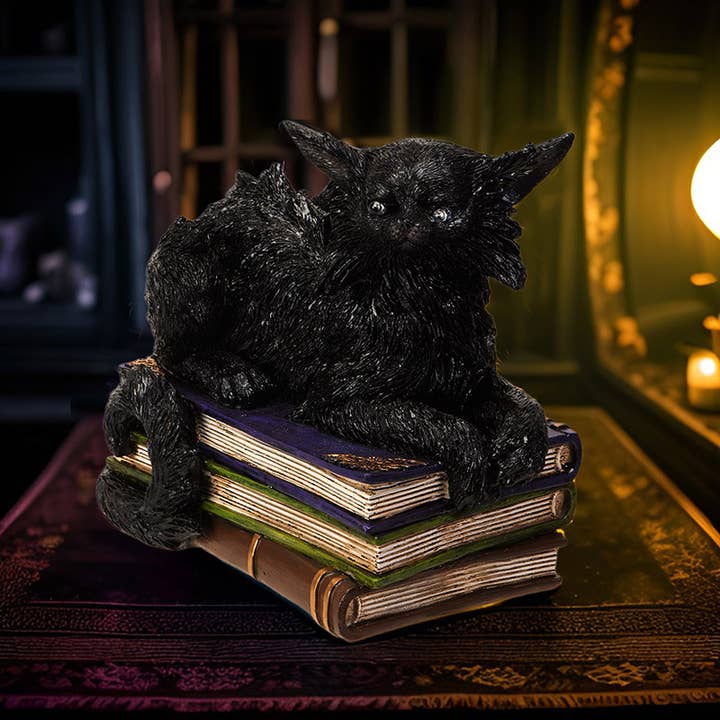 Pacific Trading - Venta al por mayor Figura decorativa - Gato Negro Místico Malvado sobre Libros con Ojos LED