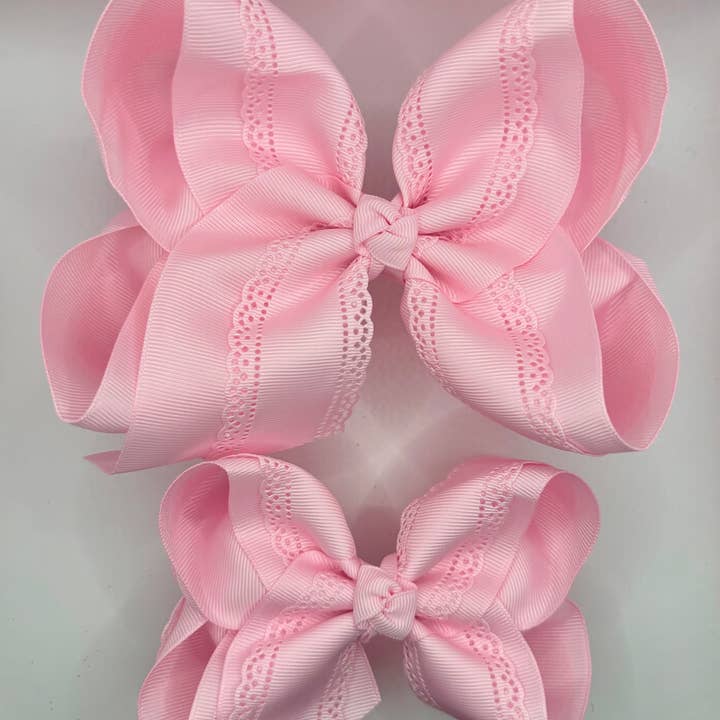 Pink Eyelet Bow for wholesale by Luminous Sky Bowtique