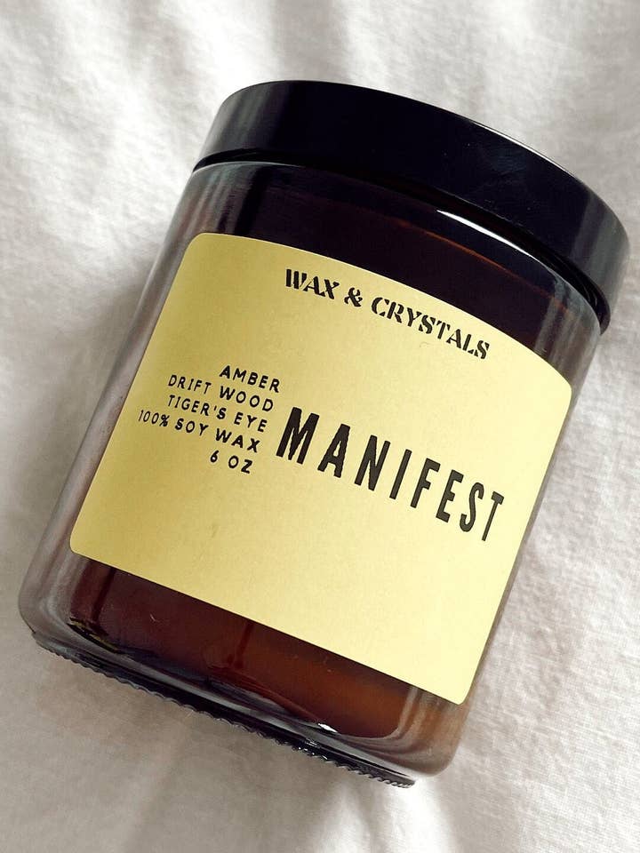Amber and Driftwood Scented Manifest Candle 6.7 oz for wholesale by Wax and Crystals