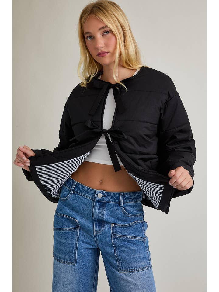 Black PUFFER JACKET WITH RIBBON TIE ON THE FRONT for wholesale on Faire1