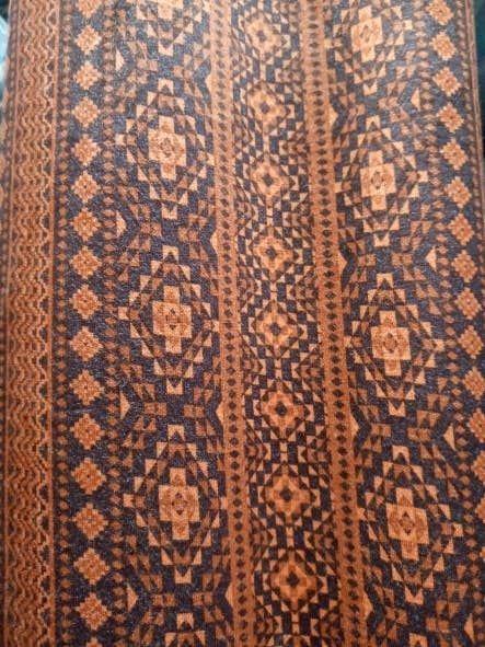 TISSU TRICOTÉ EN RAYONNE - Imprimé ethnique sur rouille pour la vente par Cutting Edge Trade