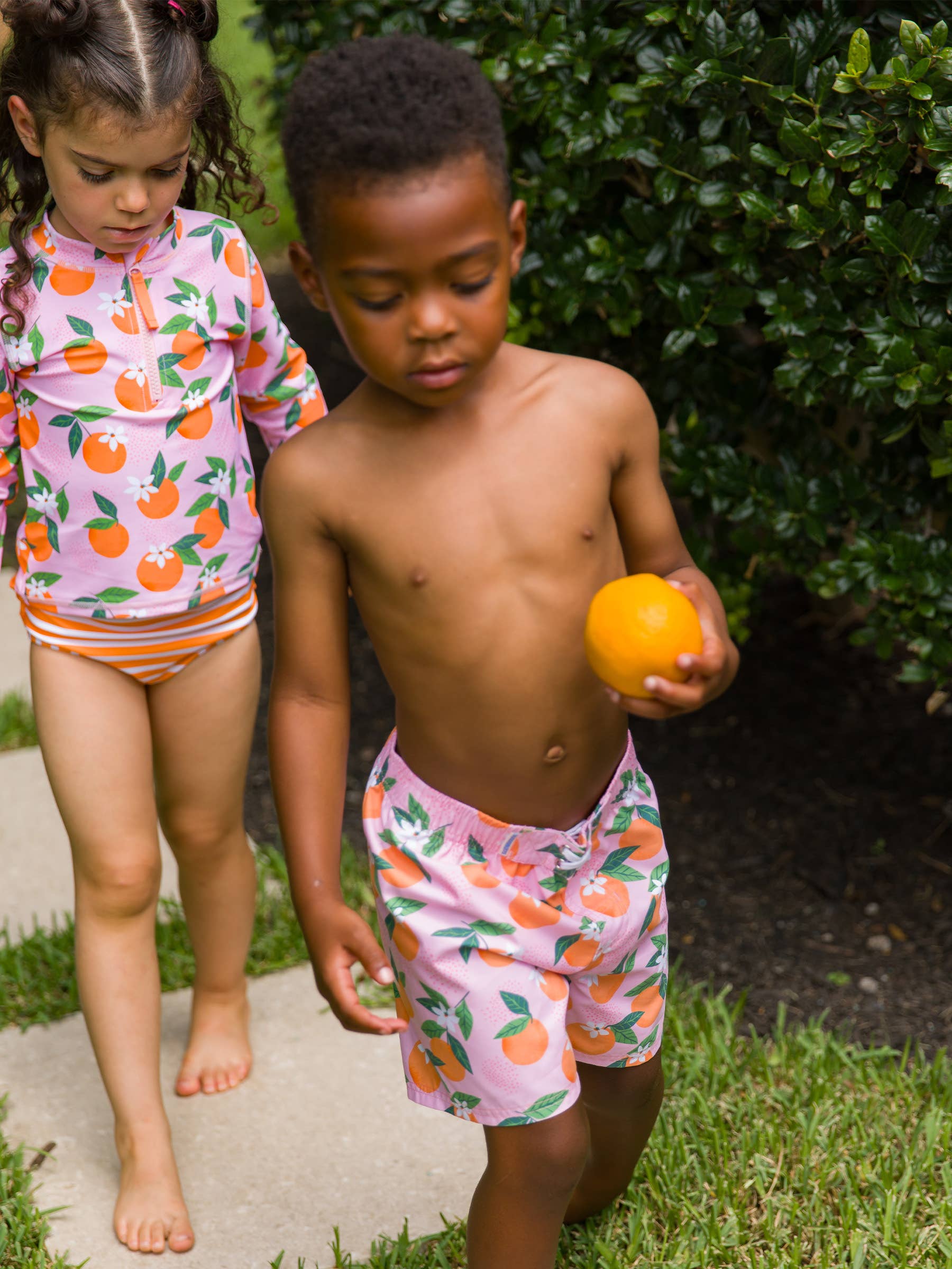 Pink Boys Orange You The Sweetest Swim Trunks for wholesale on Faire3