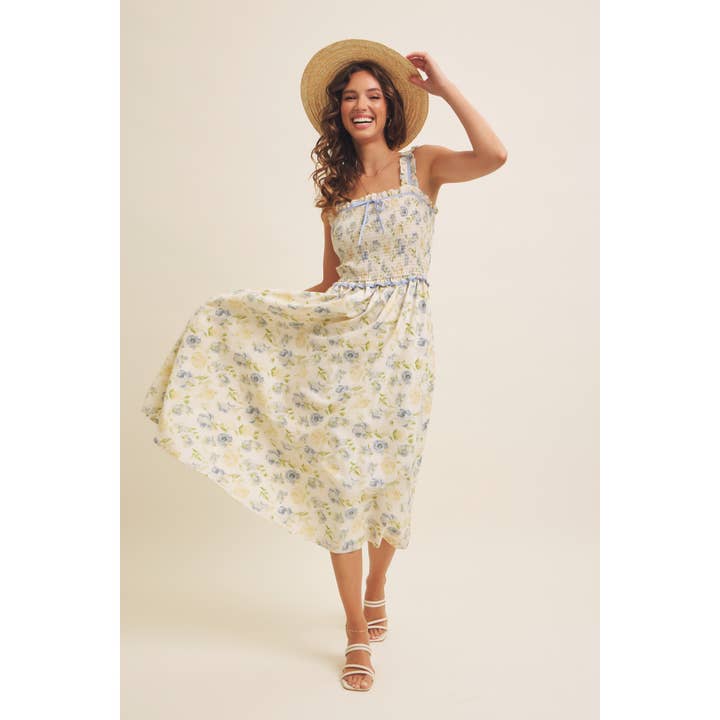 SMÖRKRÄM BLÅ Blommig midiklänning med smock och rosett för wholesale på Faire3