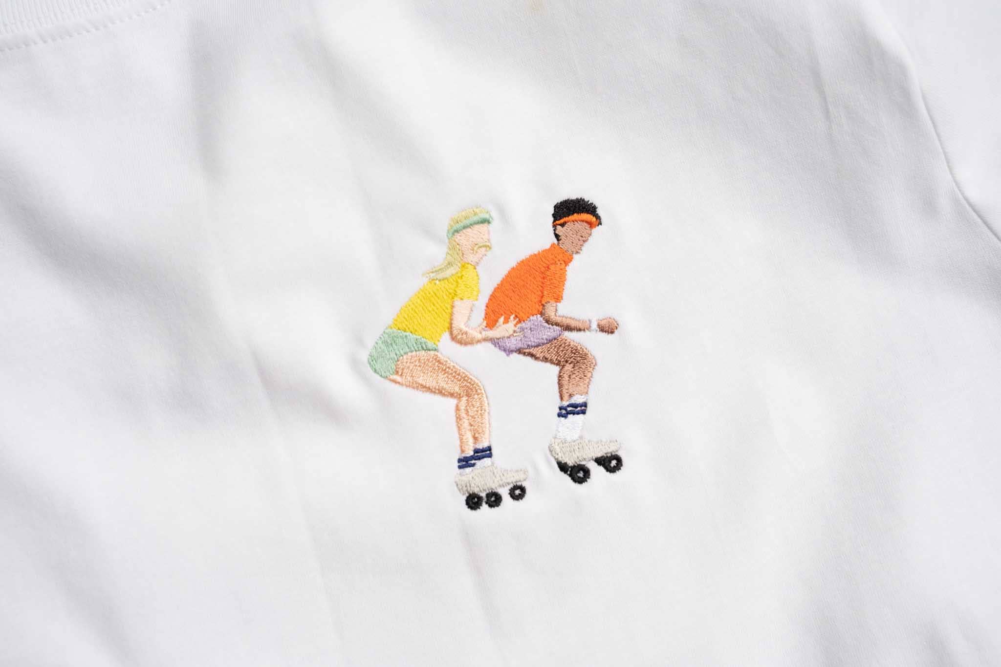 white Roller skating boys | t-shirt for wholesale on Faire0
