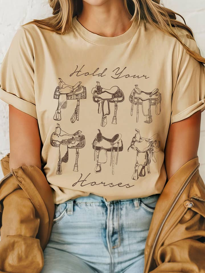 HOLD YOUR HORSE SADDLE GRAPHIC TSHIRTS for wholesale by Rustee Clothing