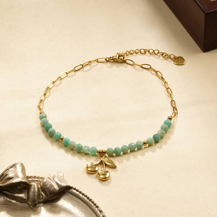 Ankelkedja med blå stenar och gyllene körsbär för wholesale av joya