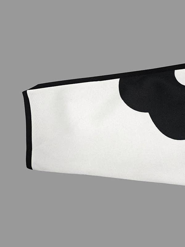 PRETO BRANCO Casaco de gola alta com manga longa, corte solto, estampa floral em cores contrastantes e abertura lateral para venda a revendedores na Faire19