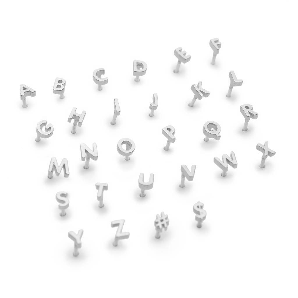 Tiny Initial Studs // Sterling Silver (individual studs) for wholesale on Faire2