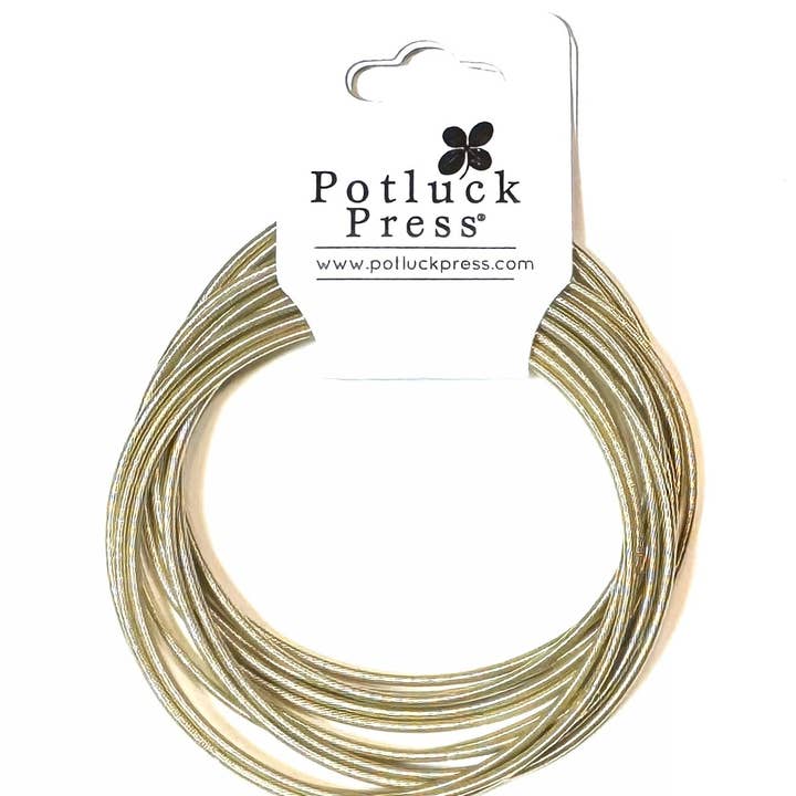 Bracelet, guitar string for wholesale by Potluck Press