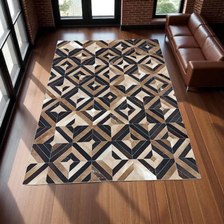 Geometric Brown Cowhide Patchwork Rug and other Purchase Wholesale cow hide rug. Free Returns & Net 60 Terms on Faire trending on Faire.