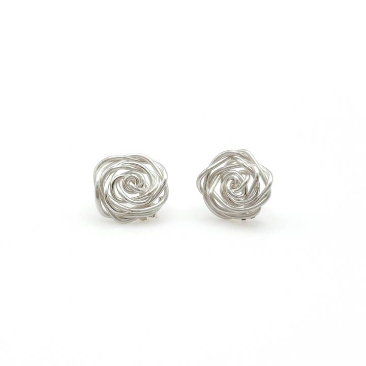 Rosette silver stud earrings for wholesale by Alegria Accessories Inc.