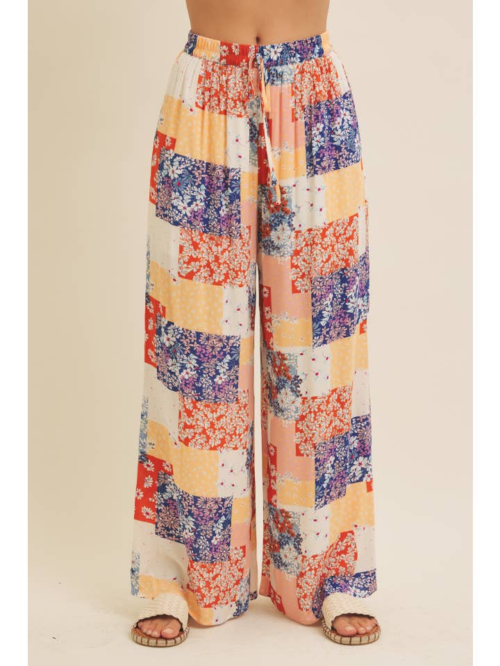 DENIM MULTI SOFT RAYON GAUZE FLORAL PATCHWORK WIDE LEG PANTS WITH POCKET for wholesale on Faire