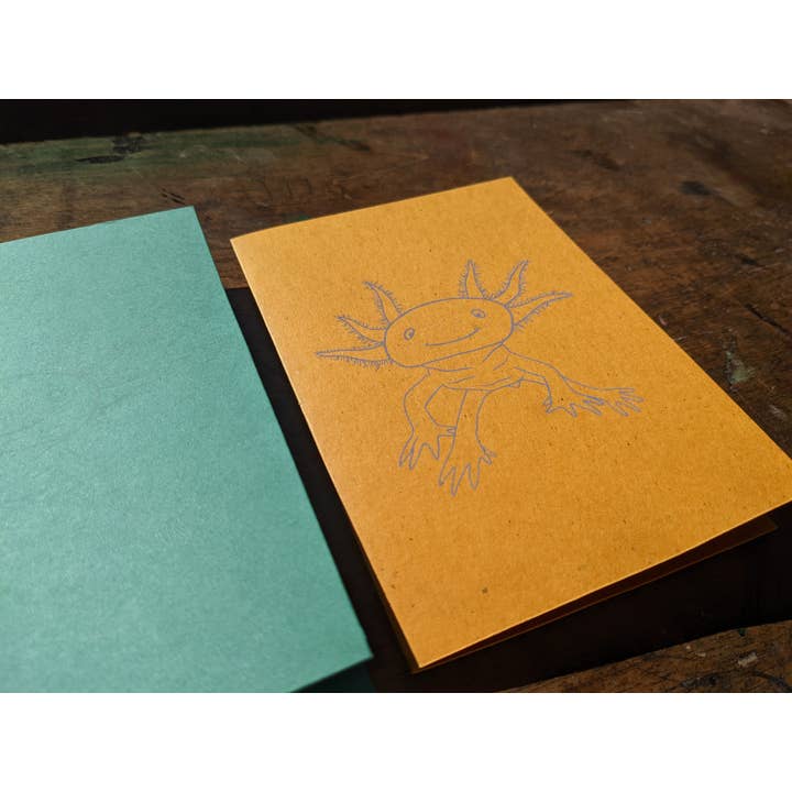 Smiling Axolotl for wholesale by Dungarees + Squeegees