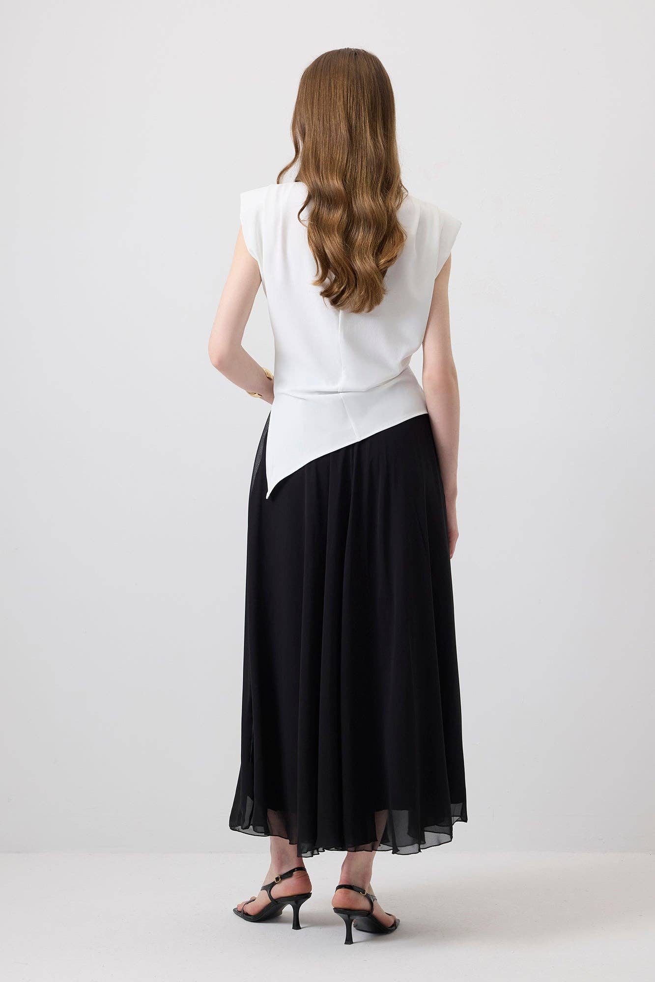 Ecru Blusa senza maniche con dettaglio asimmetrico in vita in vendita all'ingrosso su Faire2