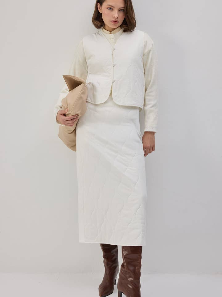 GESTEPPTE WESTE UND ROCKSET für den Großhandel von Touché Privé