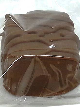 Milk Chocolate Pecan Caramel Clusters Individual for wholesale by Laketown Chocolates