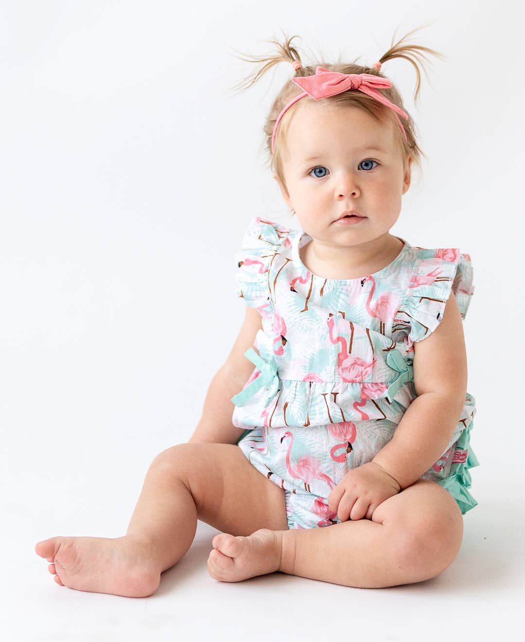 Multi Color Baby Girls Vibrant Flamingo Classic Ruffle Bubble Romper for wholesale on Faire5