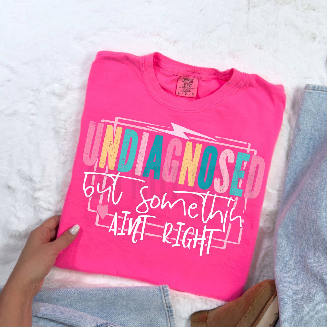 Trendy Tee Co. - Wholesale T-Shirt (Graphic) - Women's - Undiagnosed But Somethin Ain't Right Tee0