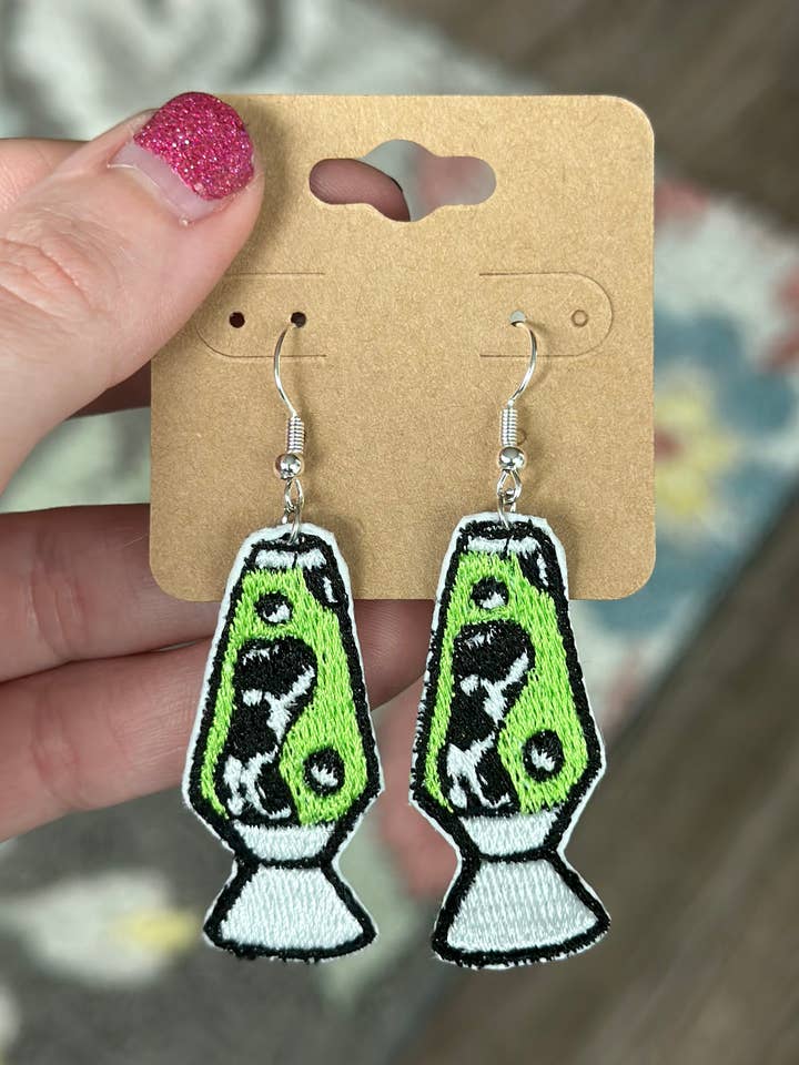 Cow Print Lava Lamp Earrings for wholesale by SlapQueen