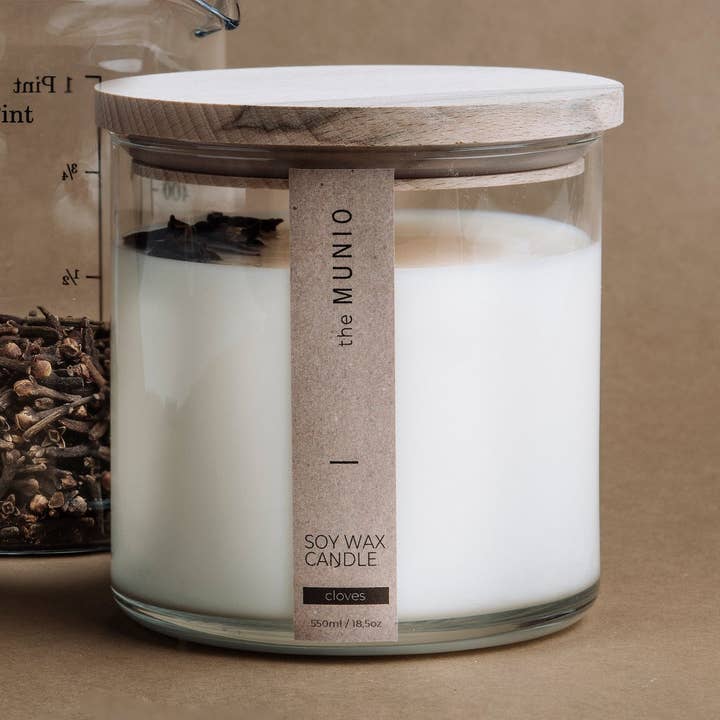 CLOVES & ORANGE CANDLE IN GLASS VOTIVE for wholesale by the MUNIO