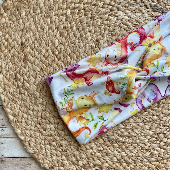 Baby Dragons Knit Twist Headband and other Purchase Wholesale in awe headbands. Free Returns & Net 60 Terms on Faire trending on Faire.