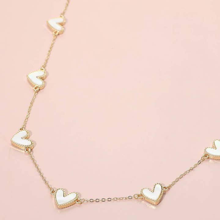 Mother of Pearl Heart Charm Station Necklace for wholesale by Sensibling Corp.