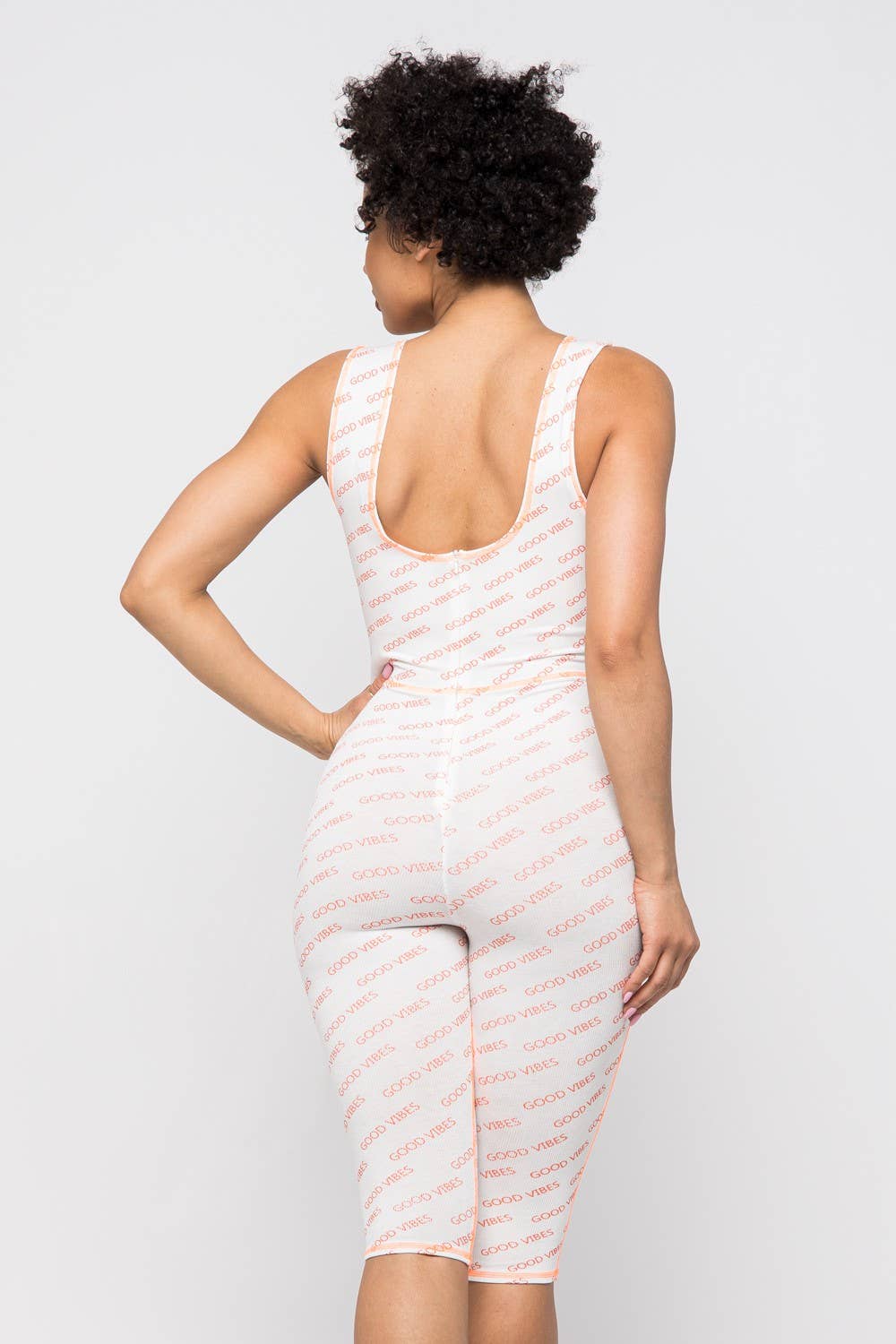 WHITE GOOD VIBES LACE-UP ROMPER for wholesale on Faire2