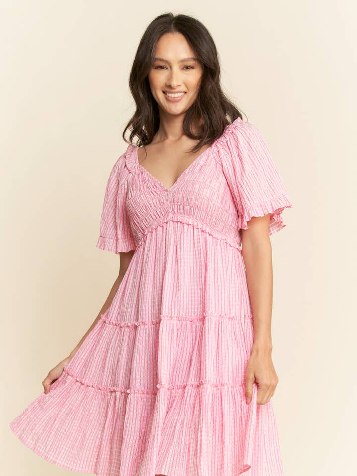 ABITO A BALZE CON SMOCKING A QUADRI JACQUARD per la vendita all'ingrosso da parte di Davi & Dani