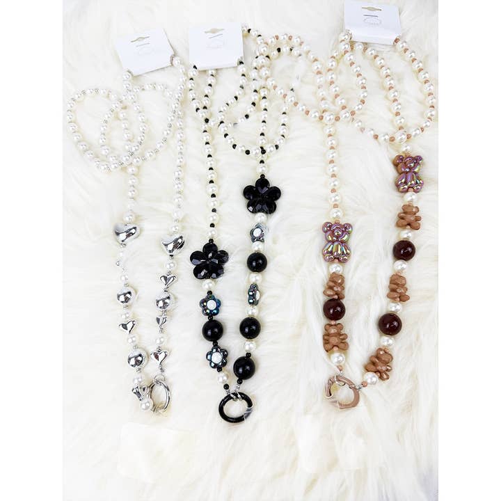 Sangle bandoulière chaîne de téléphone avec perles pour la vente par Love and Repeat