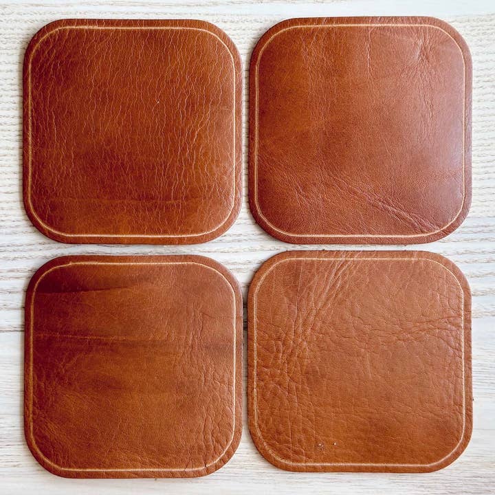 Set of 4 Leather Coasters - Drum Dyed Leather for wholesale by A. M. Aiken