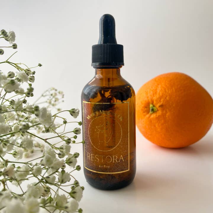 Reiki-Infused Money Magnet Oil for wholesale by Restora