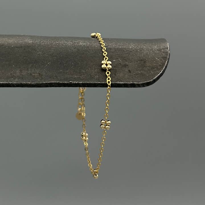 Pulsera de Flor Estacionaria de Cuatro Pétalos con Cuentas para venta al por mayor de Something Silver