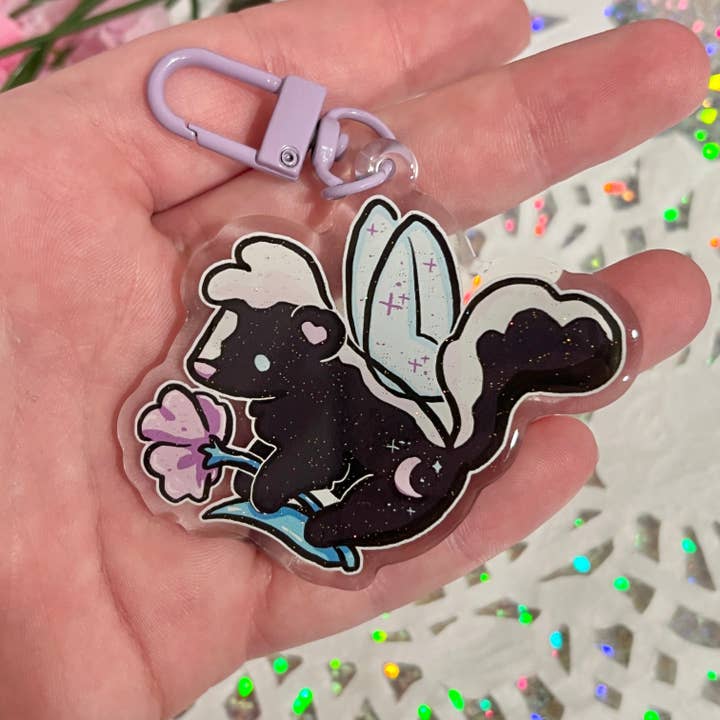 Flower Fairy Skunk ~ Glitter Charm for wholesale by Woolblossom